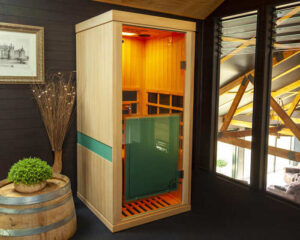 Evolve 10 one-person infrared sauna with complete 360-degree infrared body coverage in a modern home setting