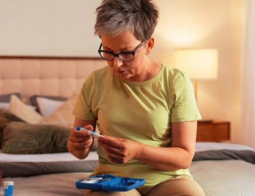 A woman with diabetes checking for benefits after an infrared sauna session.