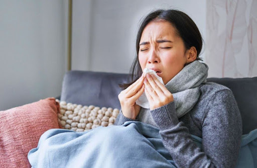 A sick woman who could benefit from using an IR sauna.