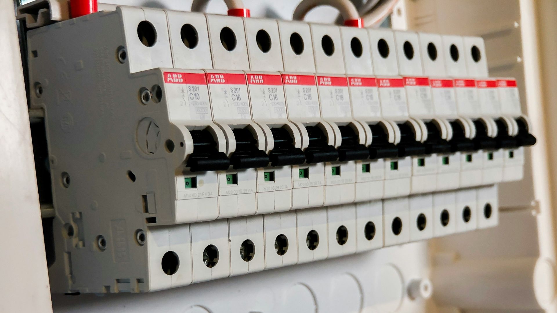 Fuse panel in a house that meets the electrical requirements for an infrared sauna